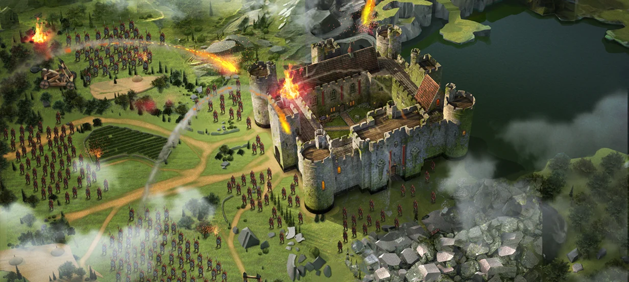 Obrázek ze hry Total Battle s ohnivým logem a helmou vedle kamenného středověkého hradu obklopeného vodním příkopem